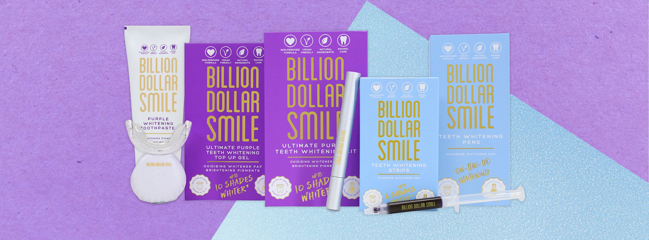 Flera Billion Dollar Smile tandblekningsprodukter står uppradade mot en lila och blå bakgrund.